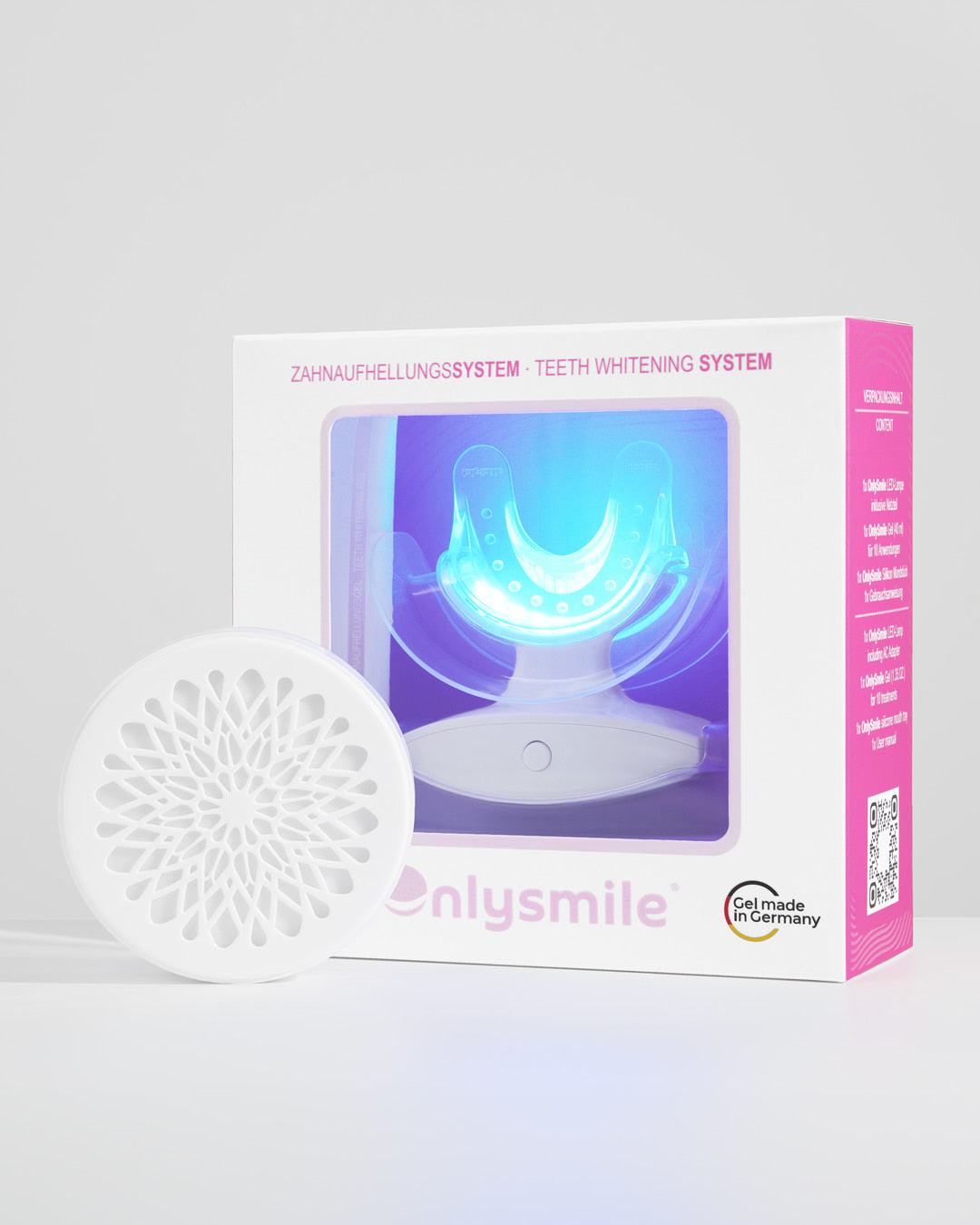 OnlySmile Zahnaufhellungssystem in Verpackung und eine Dose Zahnaufhellungspulver – minimalistische Produktaufnahme